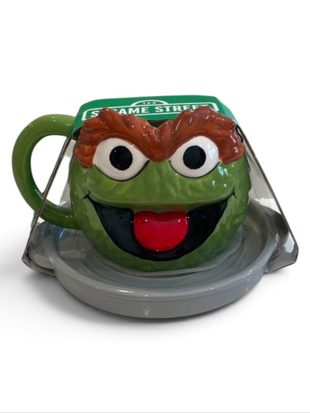 Sesame Street Oscar The Grouch Green Mug with Brown Eyebrows and Red Tongue
